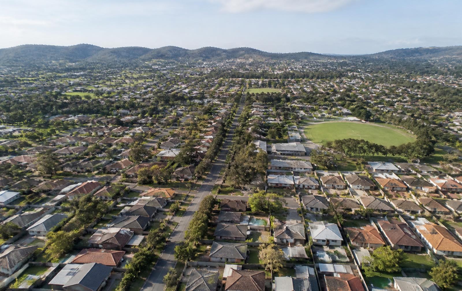 Aerial district view over Australian suburbs